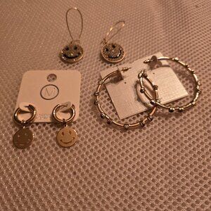 3 pairs of earrings- 2 smiley faces, & 1 hoop. Great gift for any age